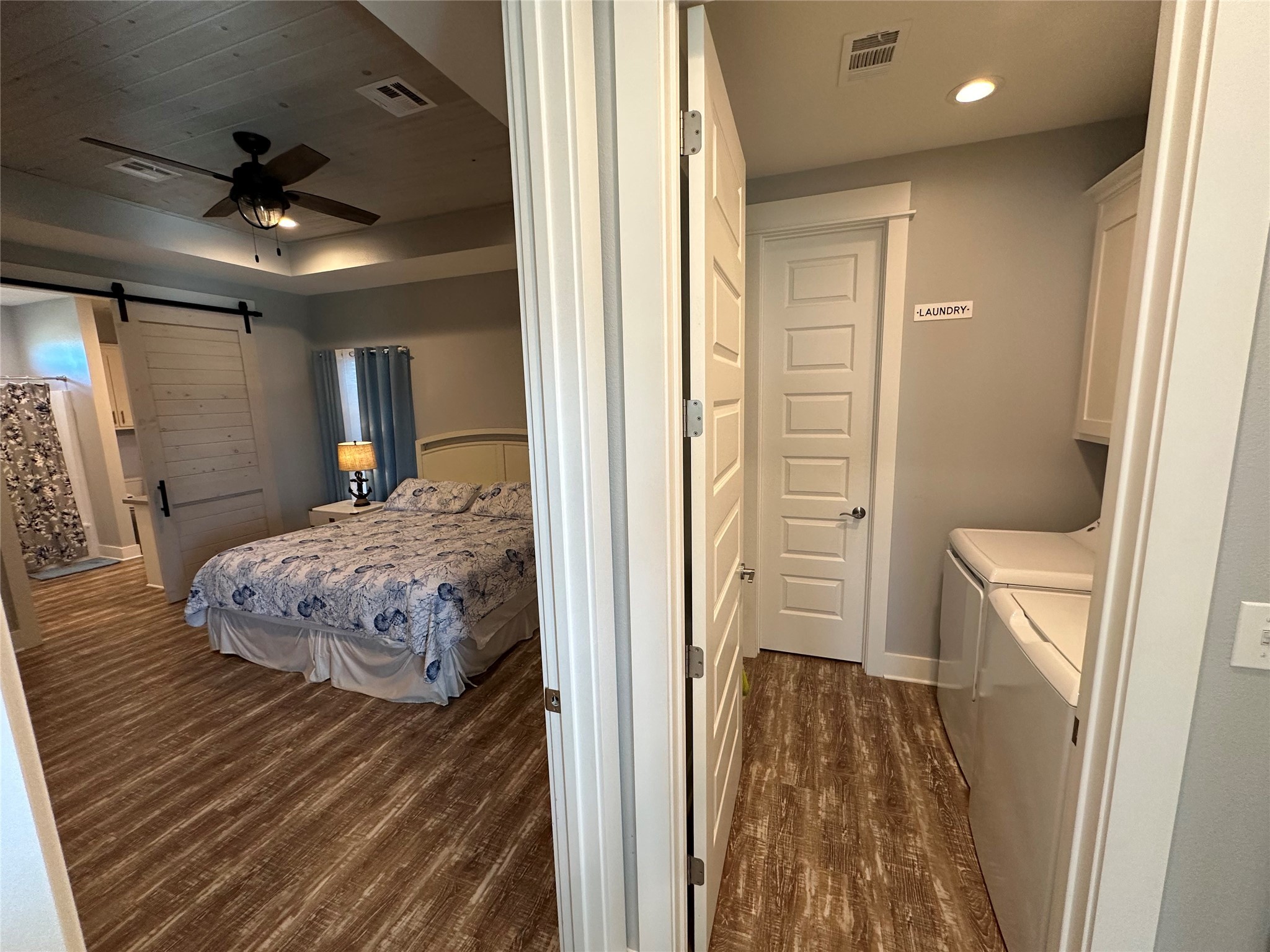 2429 Sand Castle Crystal Beach, TX 77650 - Photo 29 of 46 a bedroom with a bed and a walk in closet