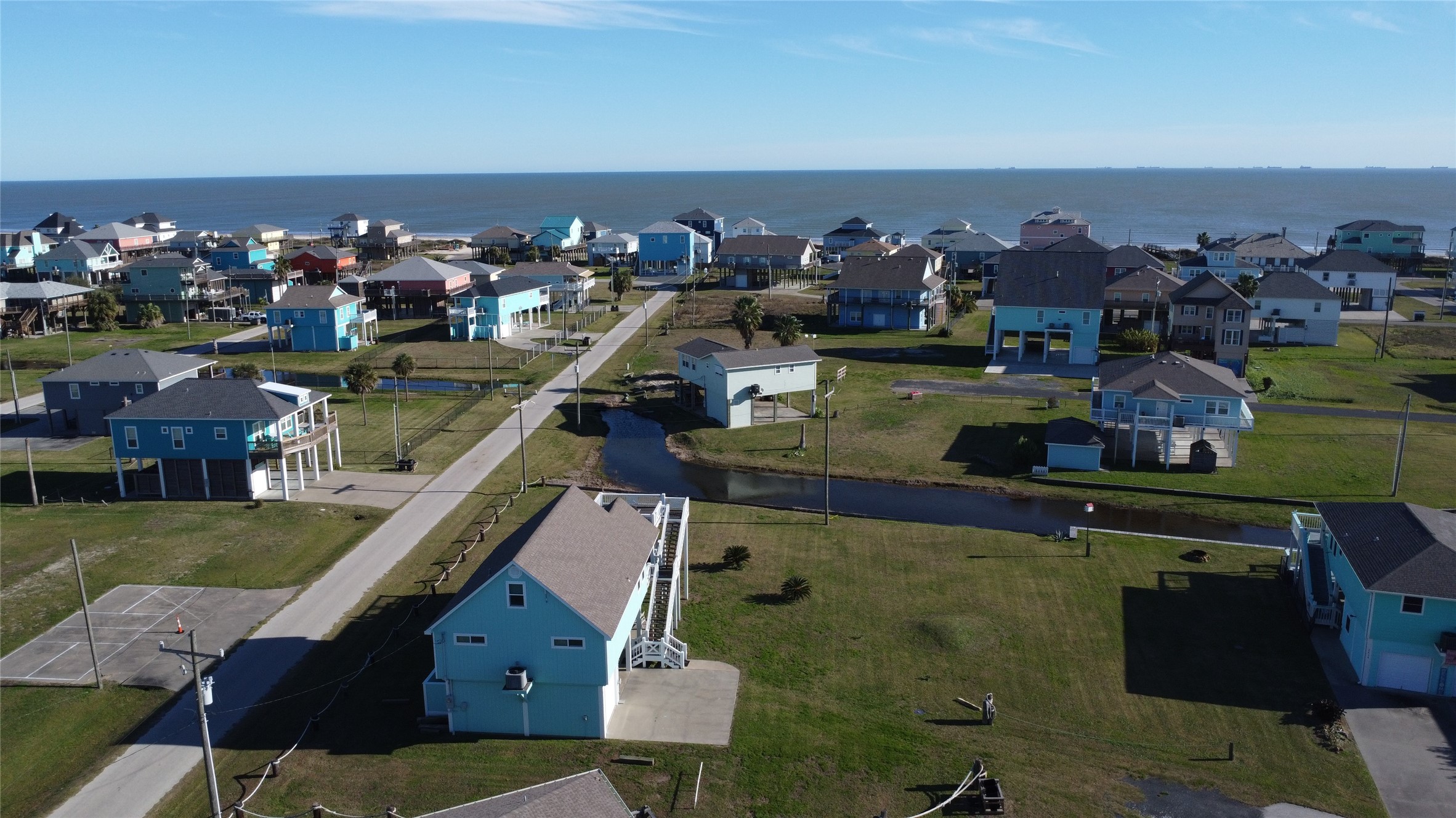 2429 Sand Castle Crystal Beach, TX 77650 - Photo 3 of 46 a view of a balcony with two chairs