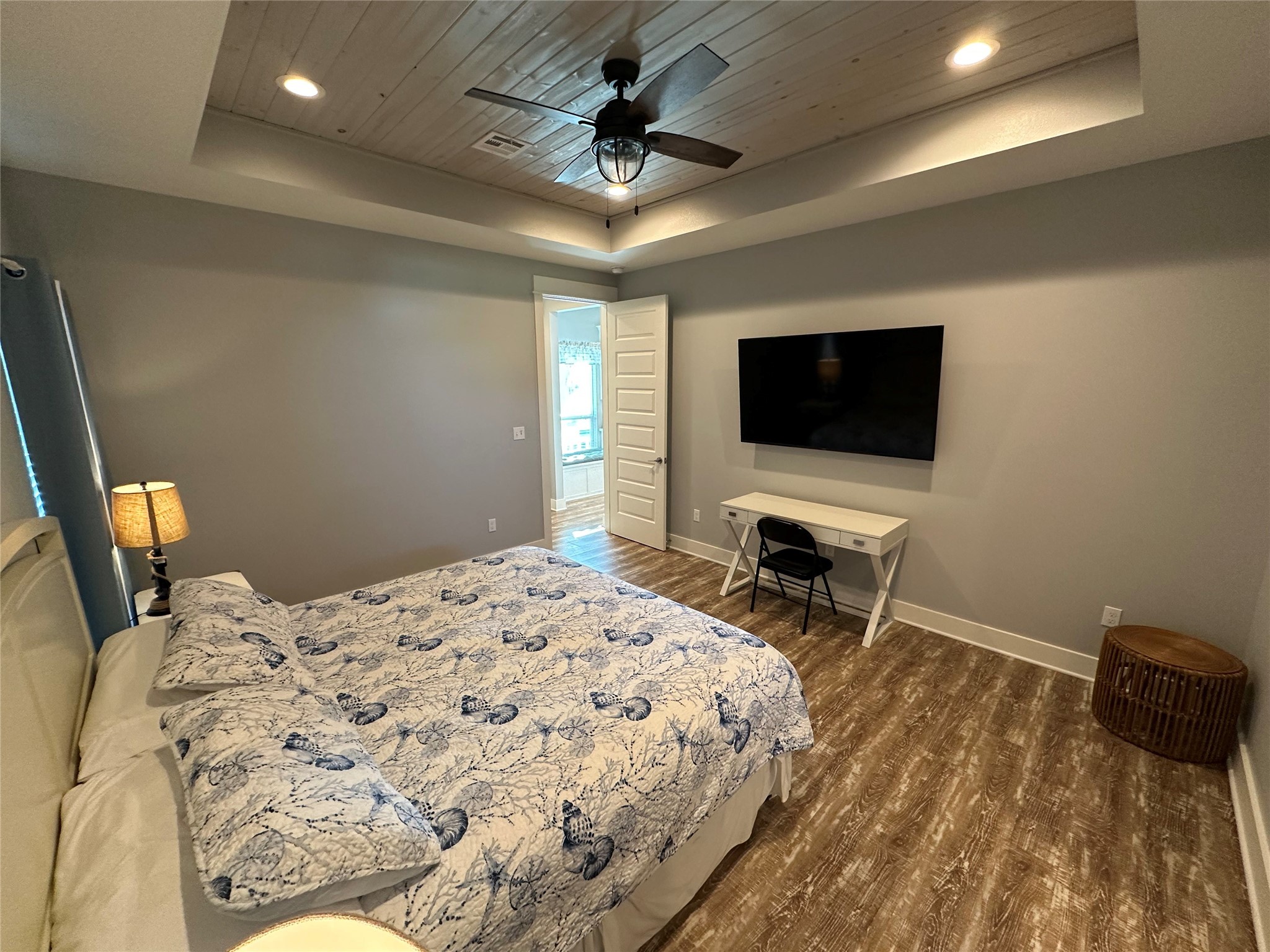 2429 Sand Castle Crystal Beach, TX 77650 - Photo 32 of 46 a bedroom with a bed and a flat screen tv