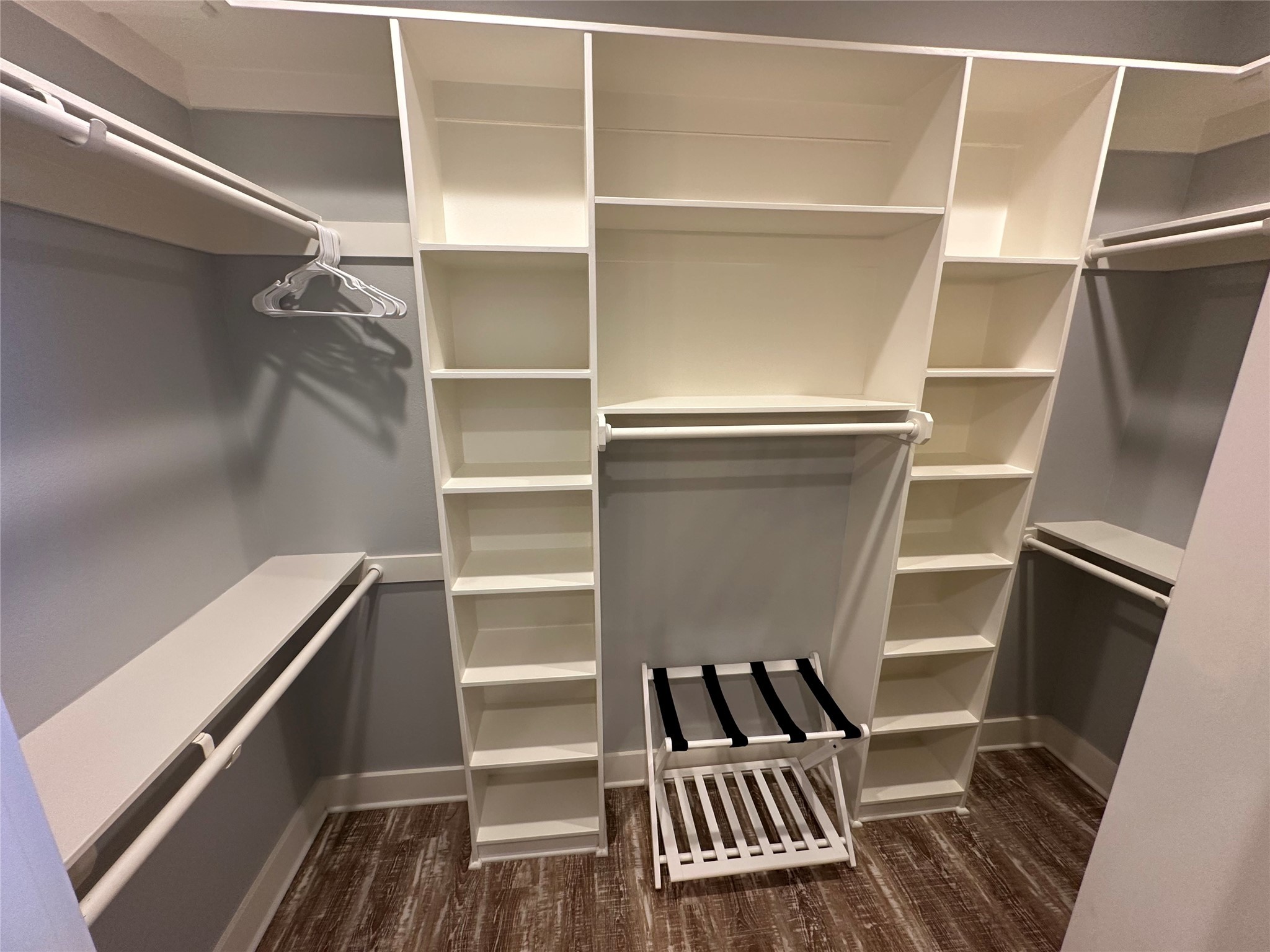 2429 Sand Castle Crystal Beach, TX 77650 - Photo 37 of 46 a view of walk in closet with wooden floor and floors