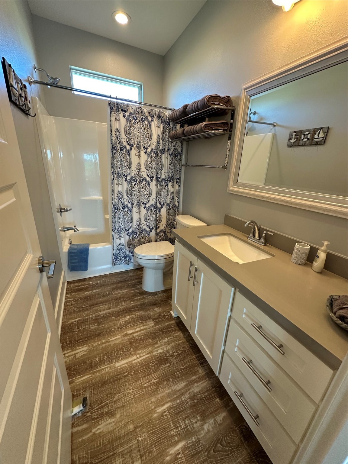 2429 Sand Castle Crystal Beach, TX 77650 - Photo 41 of 46 a bathroom with a sink and a mirror