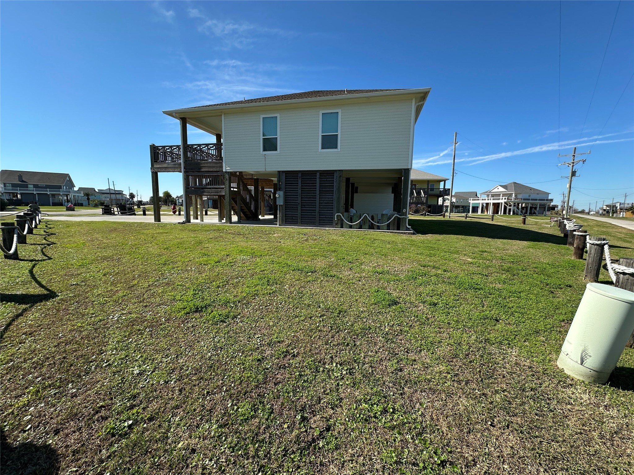 2429 Sand Castle Crystal Beach, TX 77650 - Photo 46 of 46 a view of a house with a yard