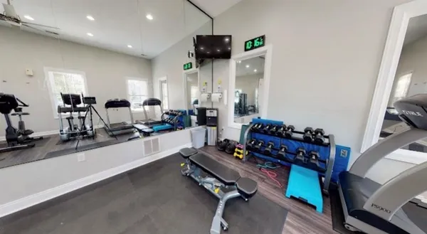 a view of a swimming pool with a patio