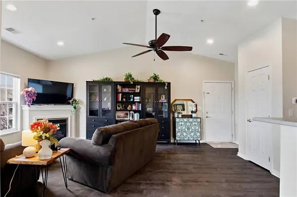 a kitchen with stainless steel appliances a stove a sink and a refrigerator