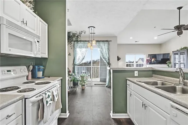 a view of balcony with wooden floor