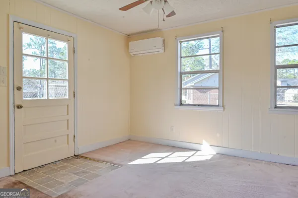 an empty room with windows