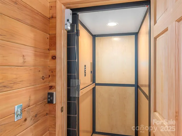 a bathroom with a shower and a sink