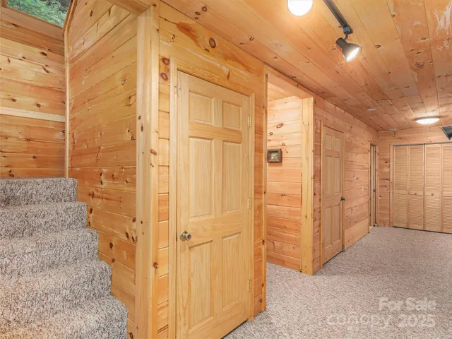 a bathroom with a toilet sink and shower