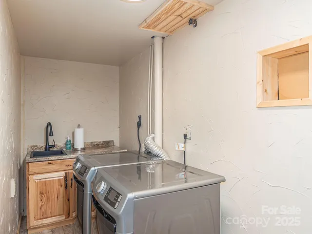 a view of a balcony with wooden floor and outdoor space