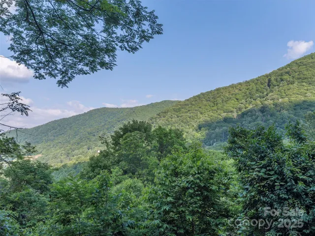 a view of a two chairs in the deck