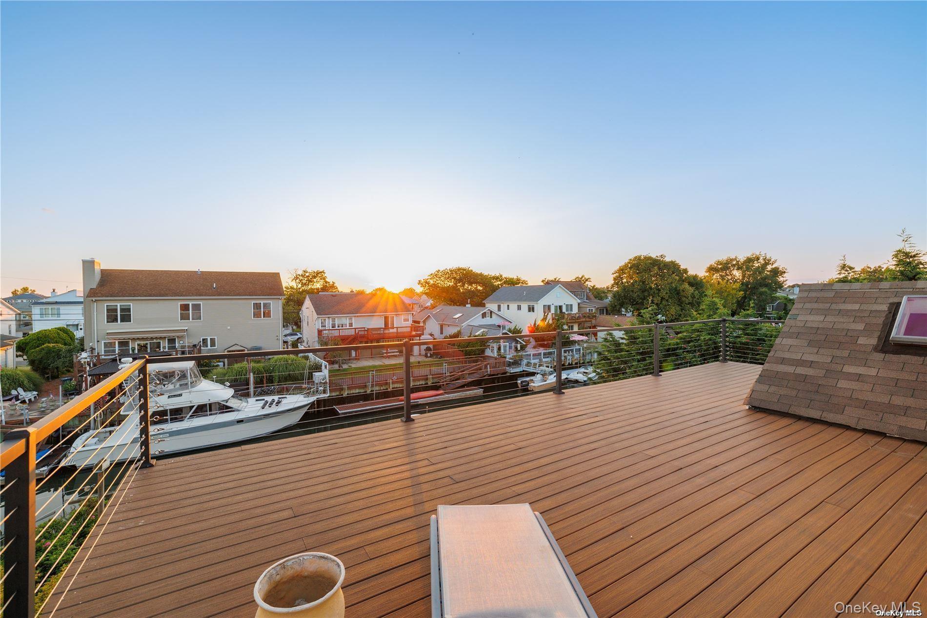 308 Bedell Street Freeport, NY 11520 - Photo 23 of 29 a view of a terrace with seating space
