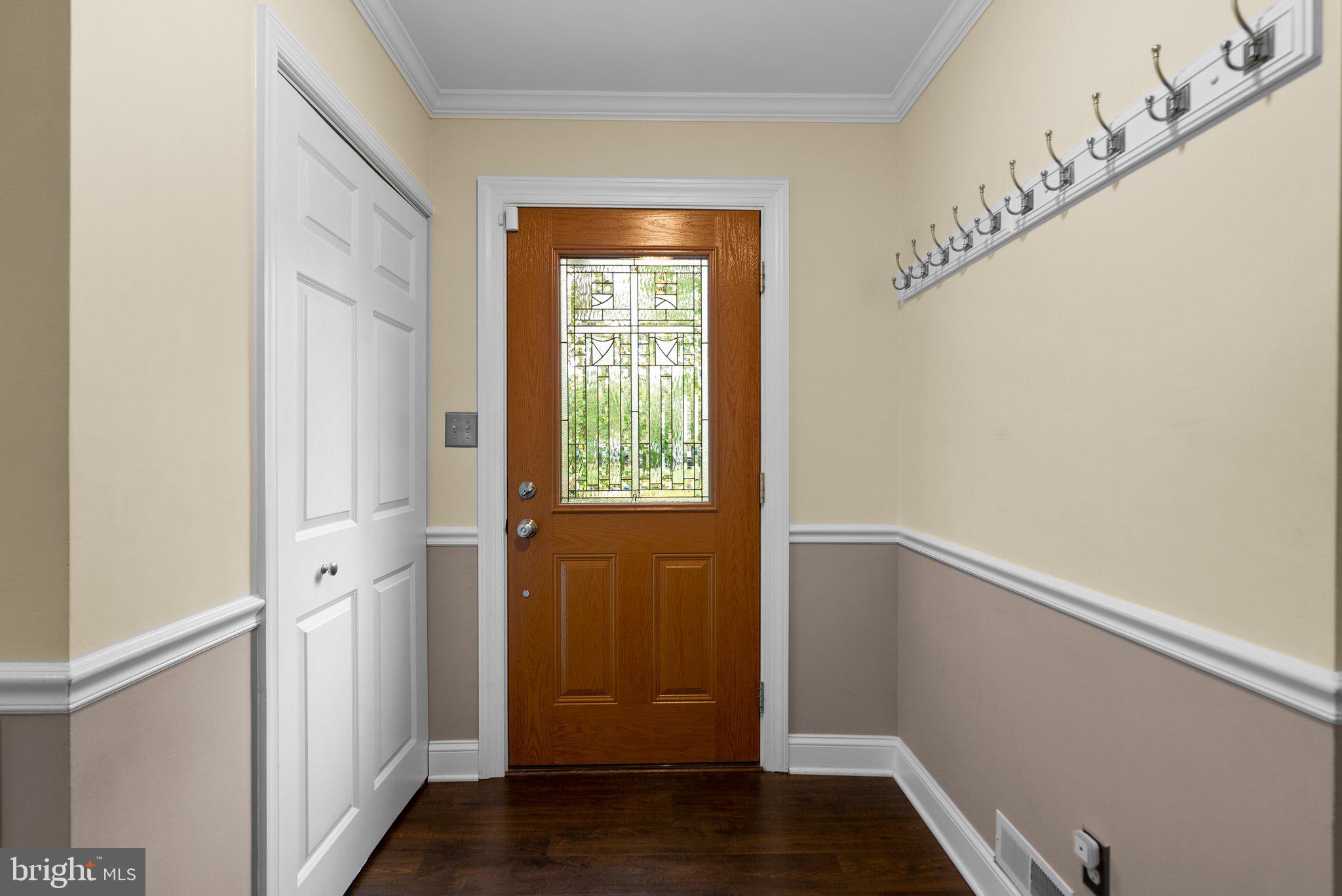 57 Oak Shade Road Gaithersburg, MD 20878 - Photo 3 of 39 Inviting Foyer with Stain Glass Door