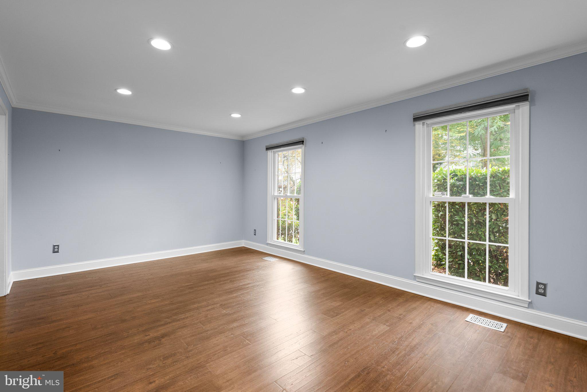 57 Oak Shade Road Gaithersburg, MD 20878 - Photo 5 of 39 Spacious Living Room with Three Oversized Windows