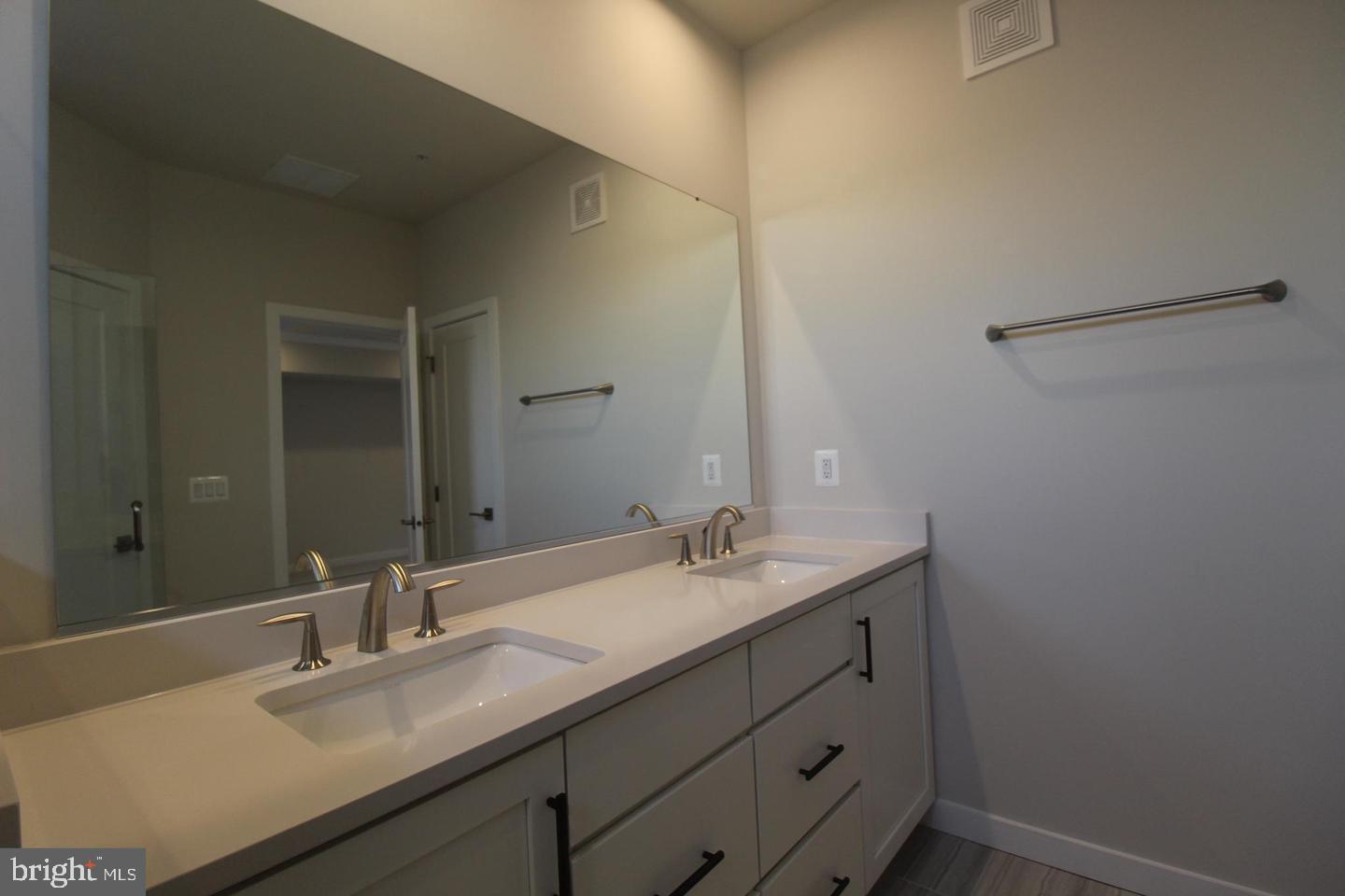 22383 Roanoke Rise Terrace Ashburn, VA 20148 - Photo 26 of 41 a bathroom with a sink and a mirror