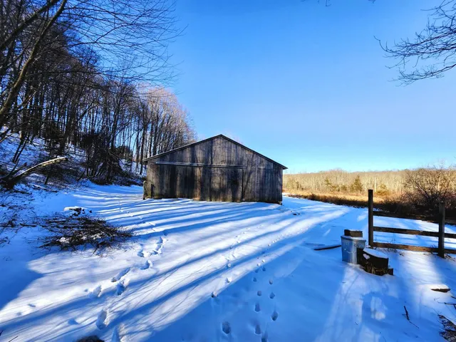 a house view with a sitting space and garden space