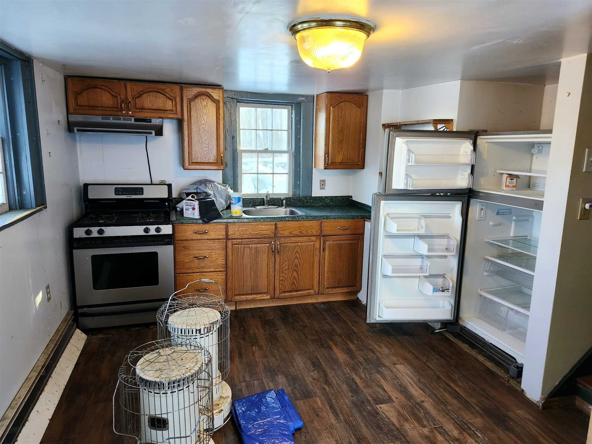 86 Wendover Road Stanford, NY 12581 - Photo 21 of 38 a kitchen with stainless steel appliances a stove a sink and a refrigerator