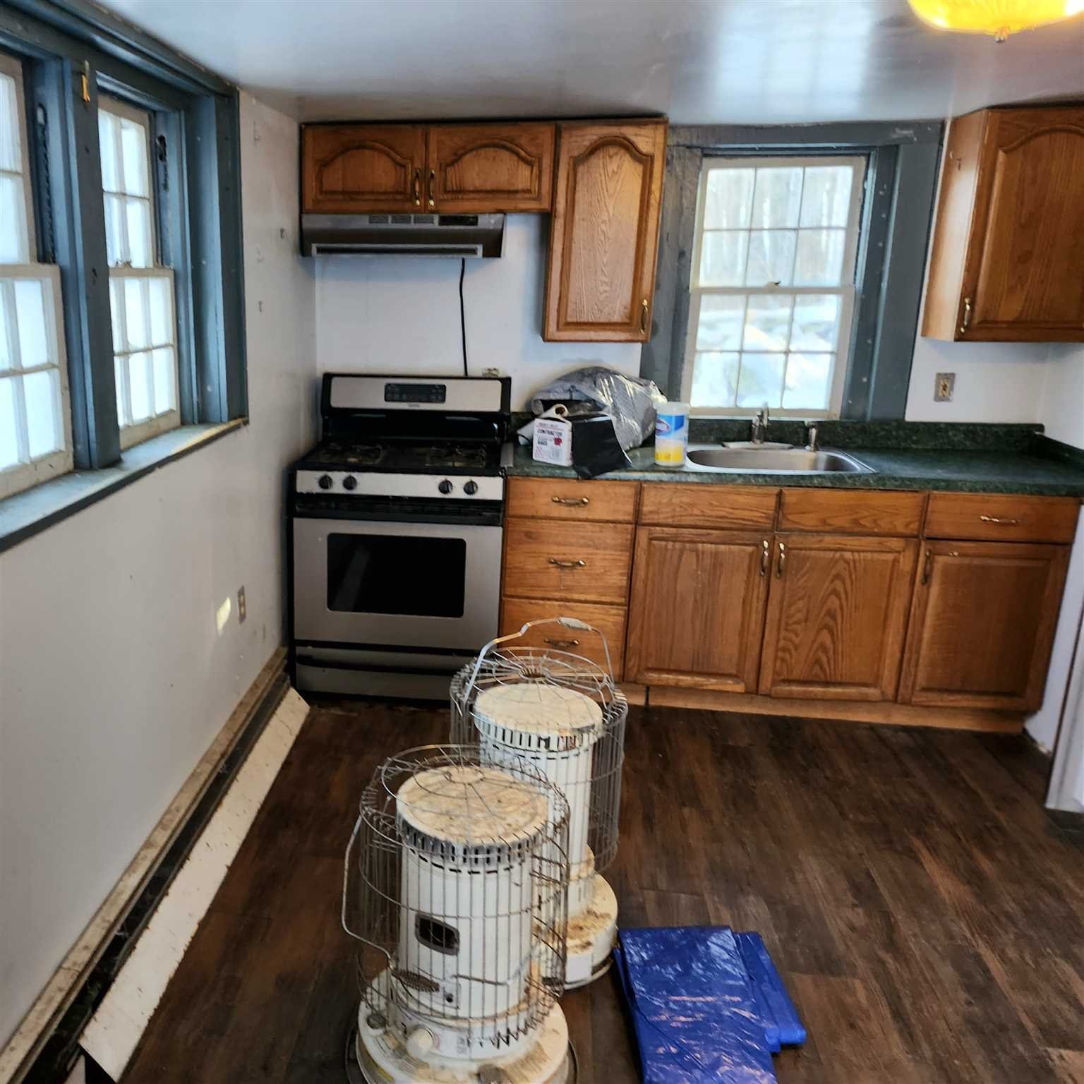 86 Wendover Road Stanford, NY 12581 - Photo 22 of 38 a kitchen with stainless steel appliances granite countertop a stove a sink and a microwave