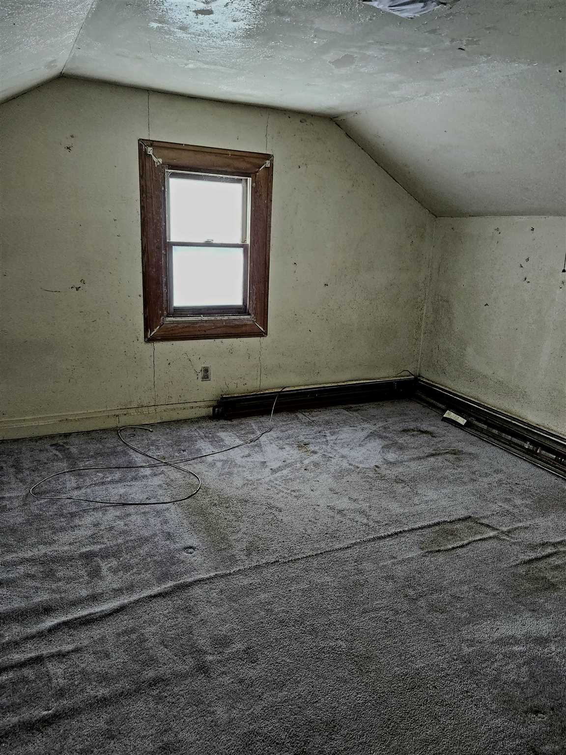86 Wendover Road Stanford, NY 12581 - Photo 27 of 38 an empty room with wooden floor and windows