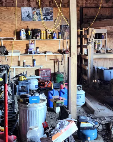 a store room with lots of different colored cloths