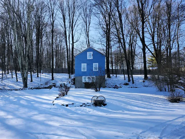 a view of a house with a patio