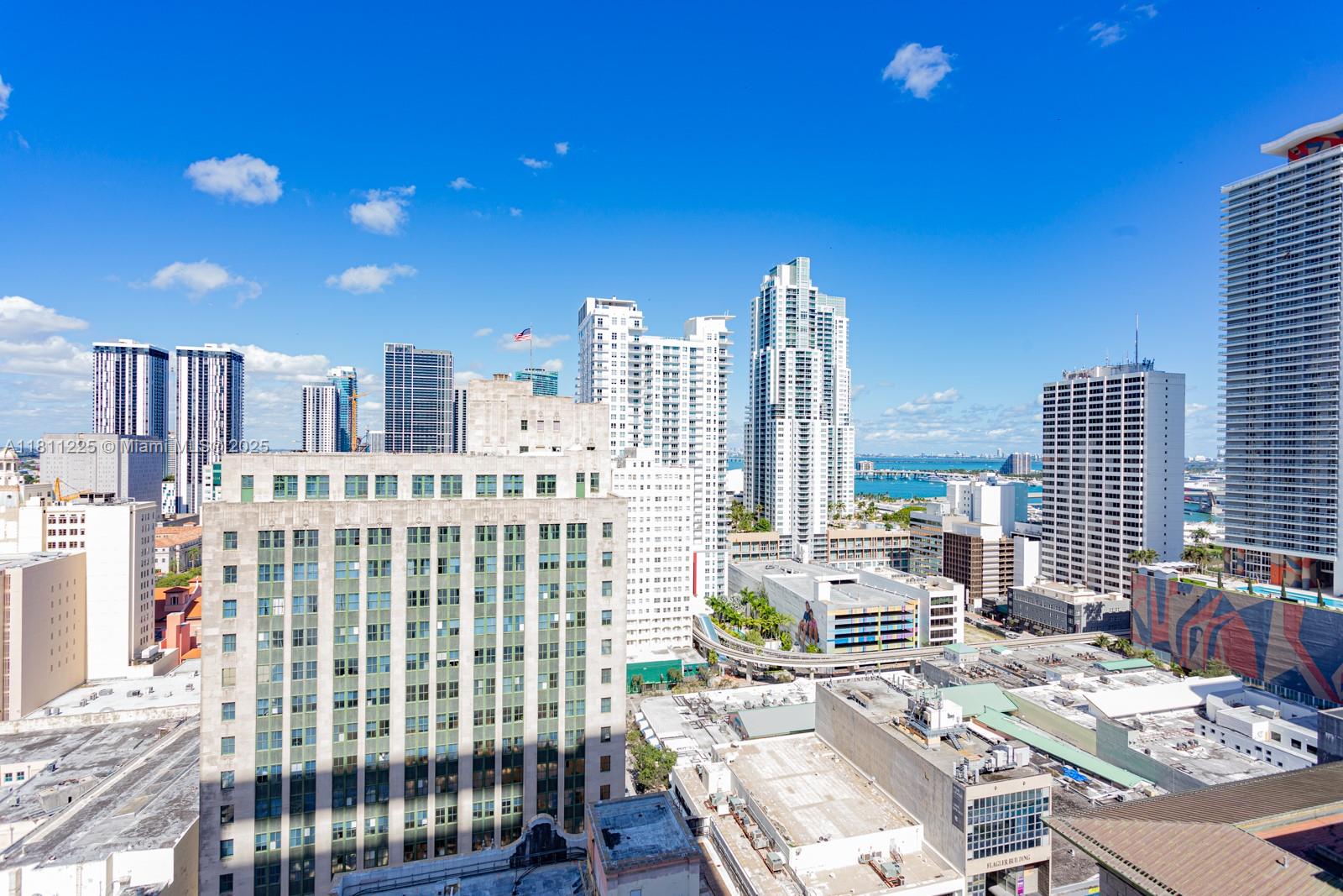 a view of a city with tall buildings