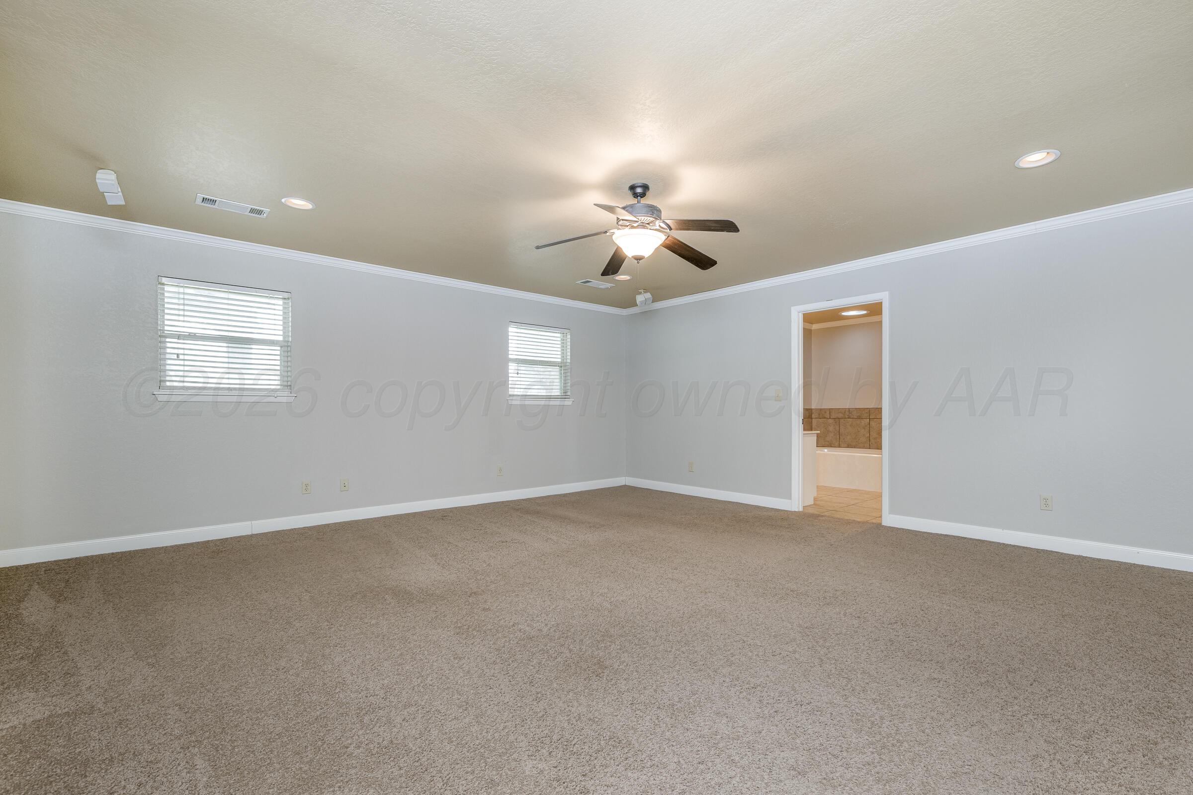4400 West Farmers Avenue Amarillo, TX 79110 - Photo 15 of 27 a view of an empty room with a window
