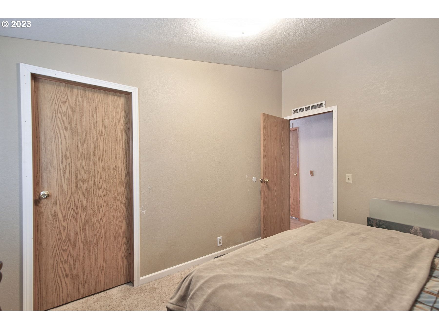 71994 Beaver Springs Road Rainier, OR 97048 - Photo 33 of 37 a bedroom with a bed and a bathroom