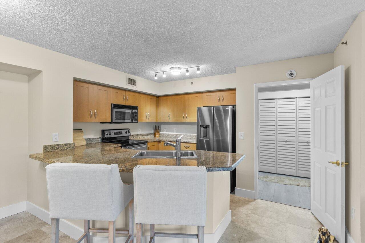 3131 Clint Moore Road, Unit 104 Boca Raton, FL 33496 - Photo 3 of 35 006-3131ClintMooreRoad-BocaRaton-FL-3349