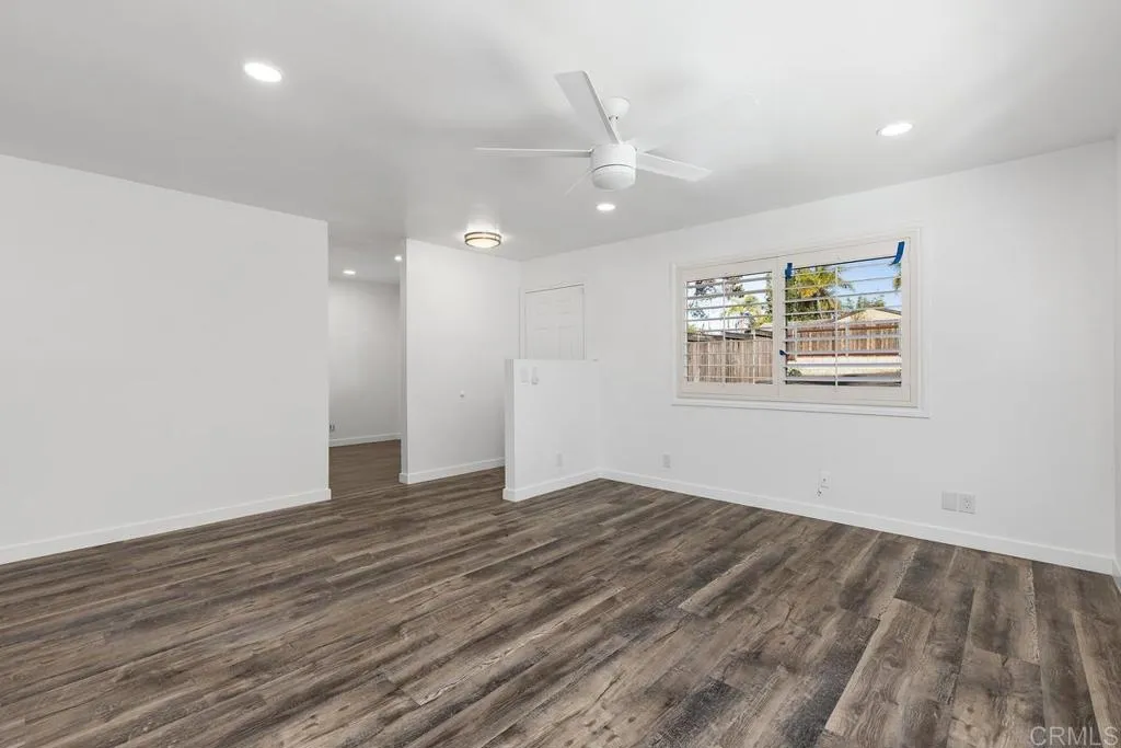 889 Bracero Road Encinitas, CA 92024 - Photo 31 of 59 wooden floor in an empty room with a window