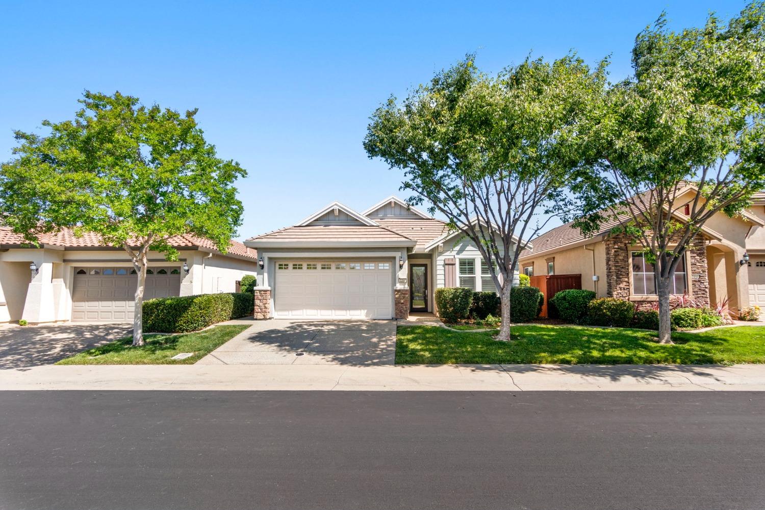 front view of a house with a street