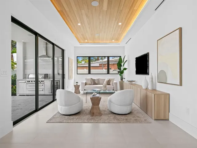 a kitchen with a white stove top oven sink and cabinets