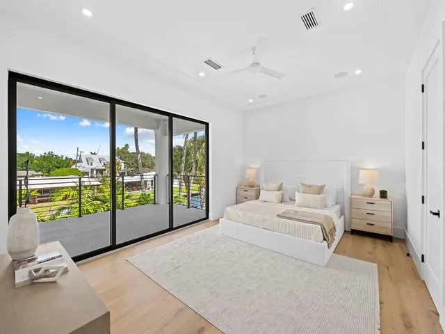 a balcony with furniture and a view of city