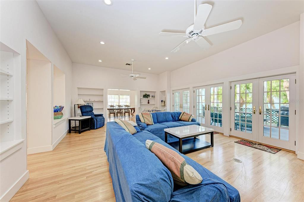 7520 Manasota Key Road Englewood, FL 34223 - Photo 33 of 96 a living room with furniture and a large window