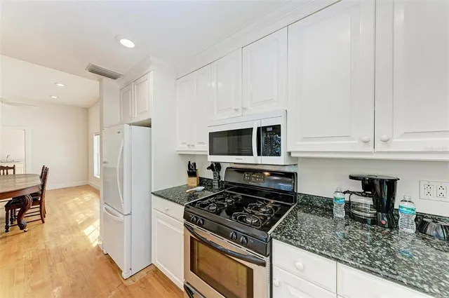 a view of a backyard of a house