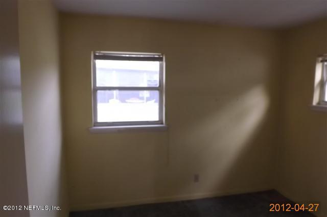 7503 Strato Road Jacksonville, FL 32210 - Photo 6 of 8 a view of a small space with window