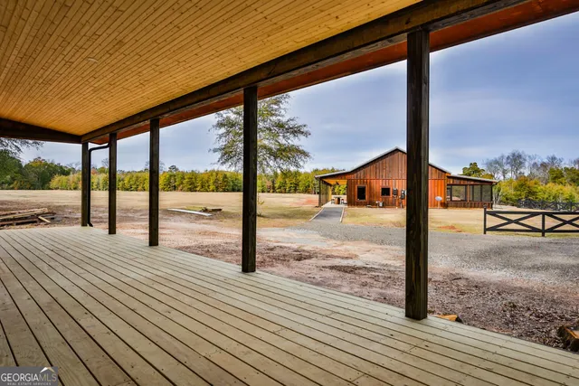 a view of a street with a large parking space