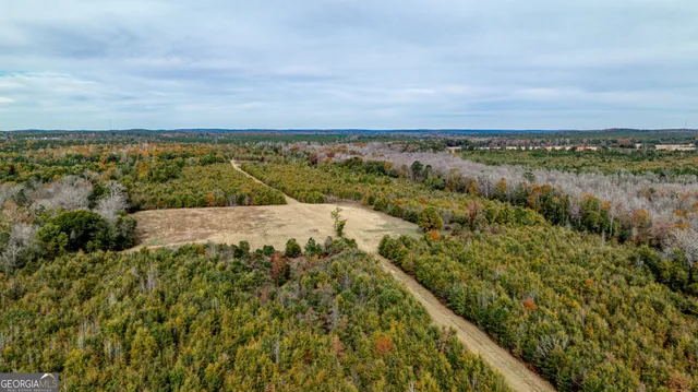 a view of a yard with an ocean