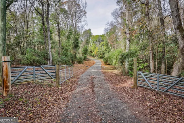 a backyard of a house with lots of green space