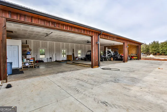 a view of a building with a garage