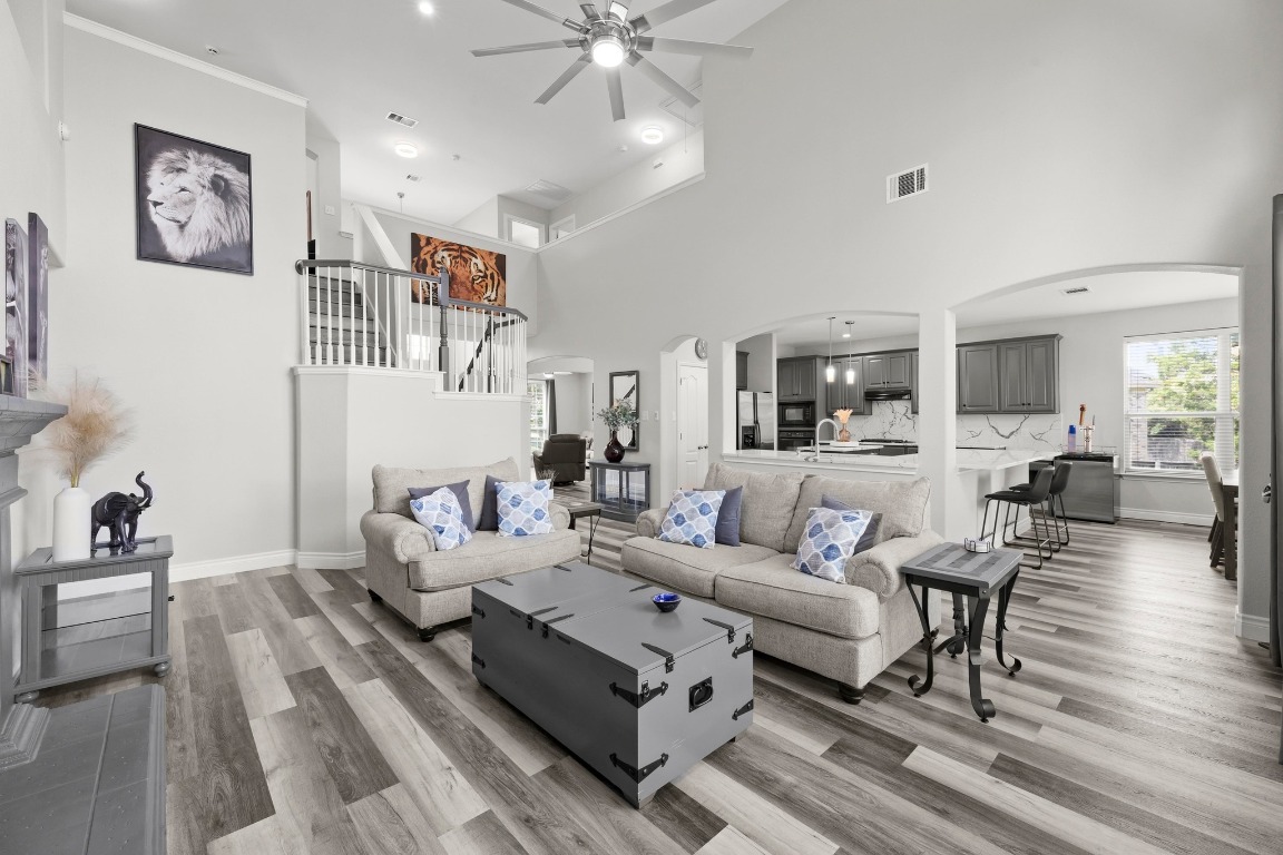 a living room with furniture and white walls