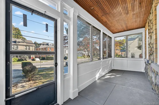 a view of a room with a large window