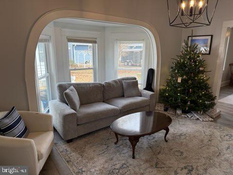 524 Lafayette Street Colonial Beach, VA 22443 - Photo 2 of 20 a living room with furniture and a potted plant