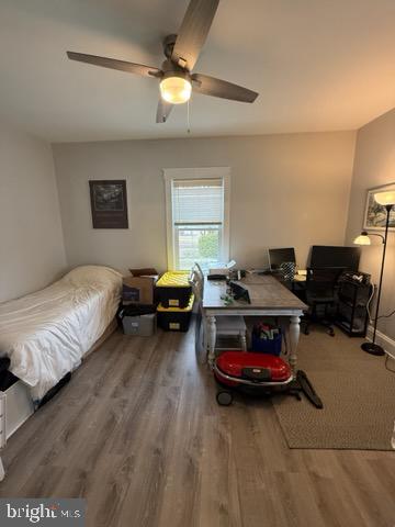 524 Lafayette Street Colonial Beach, VA 22443 - Photo 9 of 20 a living room with furniture a couch and a chandelier