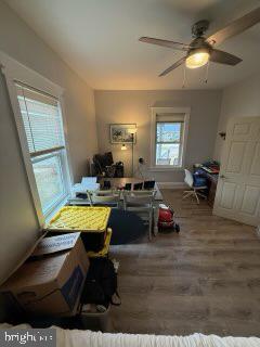 524 Lafayette Street Colonial Beach, VA 22443 - Photo 10 of 20 a kitchen with a table chairs and a wooden floor