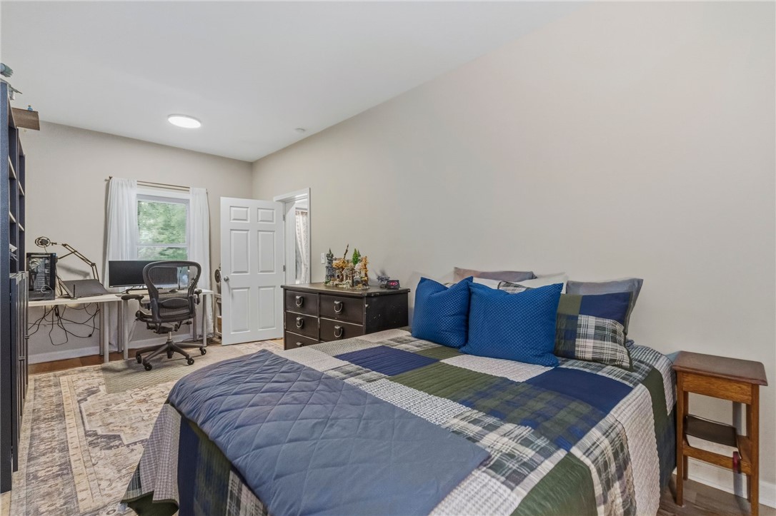 641 Lands End Road Seneca, SC 29678 - Photo 17 of 39 Well-appointed bedroom featuring a desk, chair, and a view of the outdoors through the window.