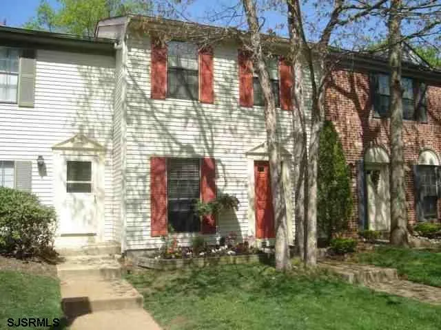 a brick building with a large windows