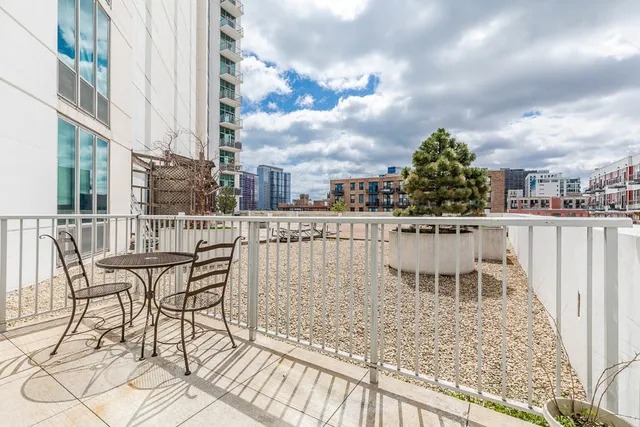 a view of a chairs and table on the terrace