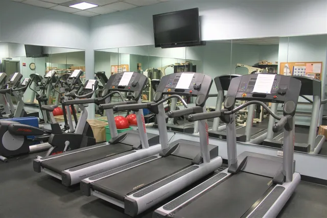a picture of a bench in front of a house