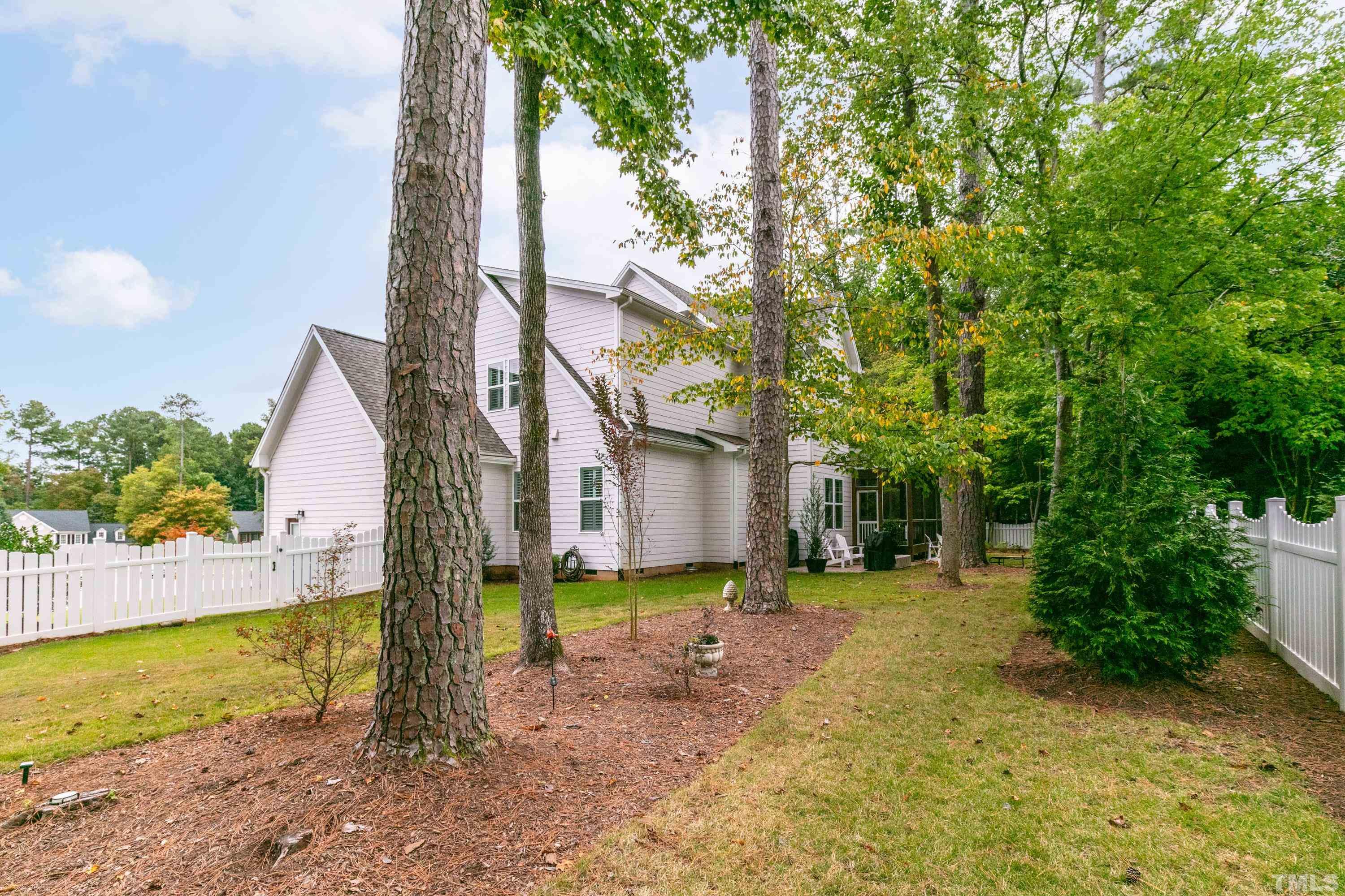 8017 Shree Court Raleigh, NC 27613 - Photo 25 of 30 a view of a yard in front of a house