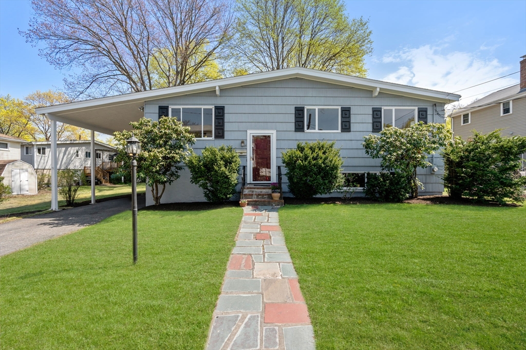 14 Fuller Avenue Newton, MA 02465 - Photo 1 of 27 a front view of a house with a yard
